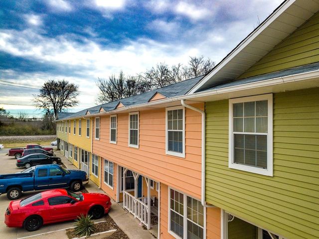 Colorful two-story townhomes at Tupelo Village