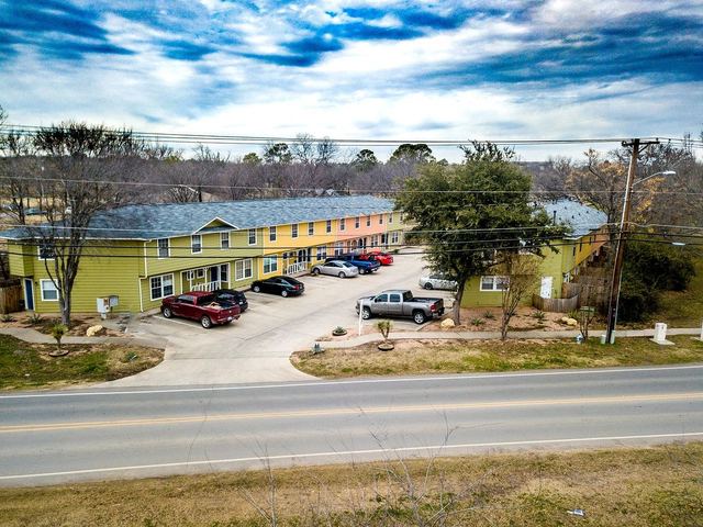 Tupelo Village townhome buildings seen from Mingo Road