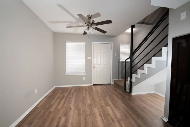 Living area and staircase in a two-story townhome